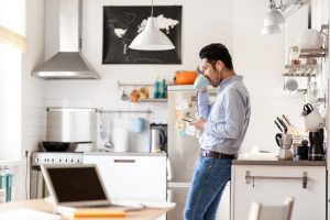 man alone in kitchen 300x200 - Living Alone Tips